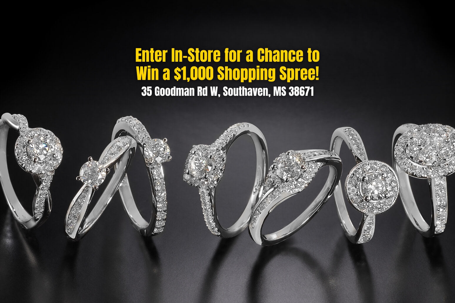 Jewelry display with promotional text for a shopping spree offer.