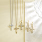 1/50 Ctw Diamond Cross Pendant in 10 Karat Yellow Gold