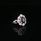 Royal Blue Sapphire Floral Diamond Halo Cocktail Ring in White Gold