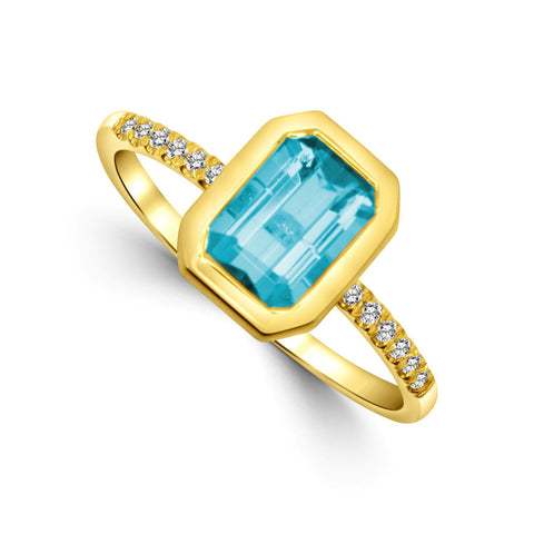 Bezel Set Emerald Cut Blue Topaz and Diamond Fashion Ring in Yellow Gold