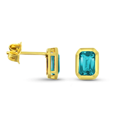 Bezel Set Emerald Cut Blue Topaz Stud Earrings in Yellow Gold