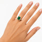 Emerald and Diamond Halo Ring in 14 Karat Yellow Gold
