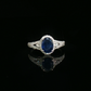Oval Sapphire and Diamond Halo Ring in 10K White Gold