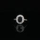 Oval Sapphire and Diamond Halo Ring in 14k White Gold