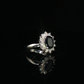 Oval Sapphire and Diamond Halo Ring in 14 Karat White Gold