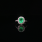 Oval Emerald Diamond Halo Ring in 14 Karat White Gold