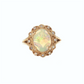 Opal and Diamond Halo Ring in Yellow Gold