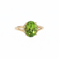 Oval Peridot and Diamond Hidden Halo Ring in Yellow Gold