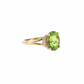 Oval Peridot and Diamond Hidden Halo Ring in Yellow Gold