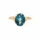 Oval London Blue Topaz and Diamond Accent Ring in 10K Yellow Gold