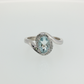 Oval Aquamarine and Diamond Bypass Ring in Sterling Silver
