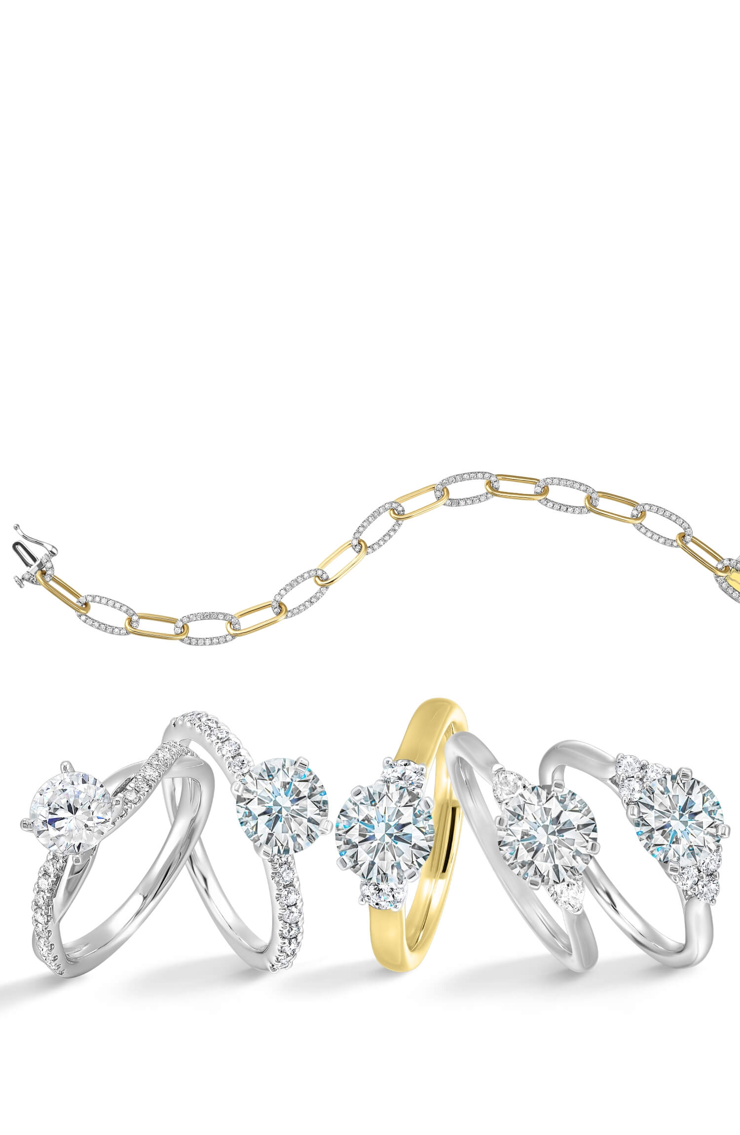 Three diamond rings in silver, gold, and white on a light gray background