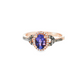Oval Tanzanite and Diamond Halo Ring in Rose Gold