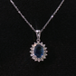 14K White Gold Oval Sapphire and Diamond Halo Necklace