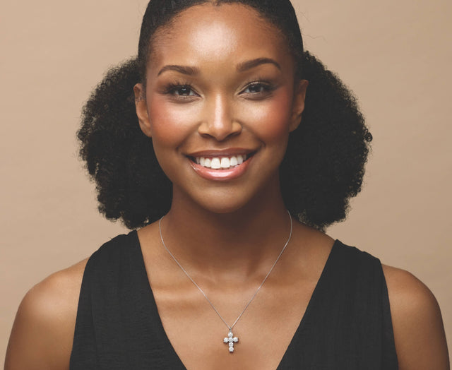 woman wearing diamond necklace