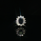 Oval Sapphire and Diamond Halo Ring in 14 Karat White Gold