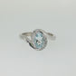 Oval Aquamarine and Diamond Bypass Ring in Sterling Silver