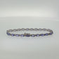 Oval Tanzanite and White Sapphire Tennis Bracelet in Sterling Silver