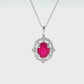 Oval Ruby and Diamond Halo Necklace in 14K White Gold