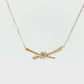 Diamond Pavé Knot Necklace in 14K Yellow Gold
