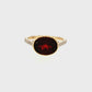 Oval Bezel Garnet and Diamond Ring in 14K Yellow Gold