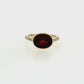 Oval Bezel Garnet and Diamond Ring in 14K Yellow Gold