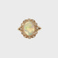 Opal and Diamond Halo Ring in Yellow Gold