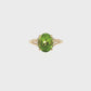 Oval Peridot and Diamond Hidden Halo Ring in Yellow Gold