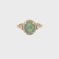 Oval Opal Diamond Halo Ring in Yellow Gold