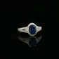 Oval Sapphire and Diamond Halo Ring in 10K White Gold